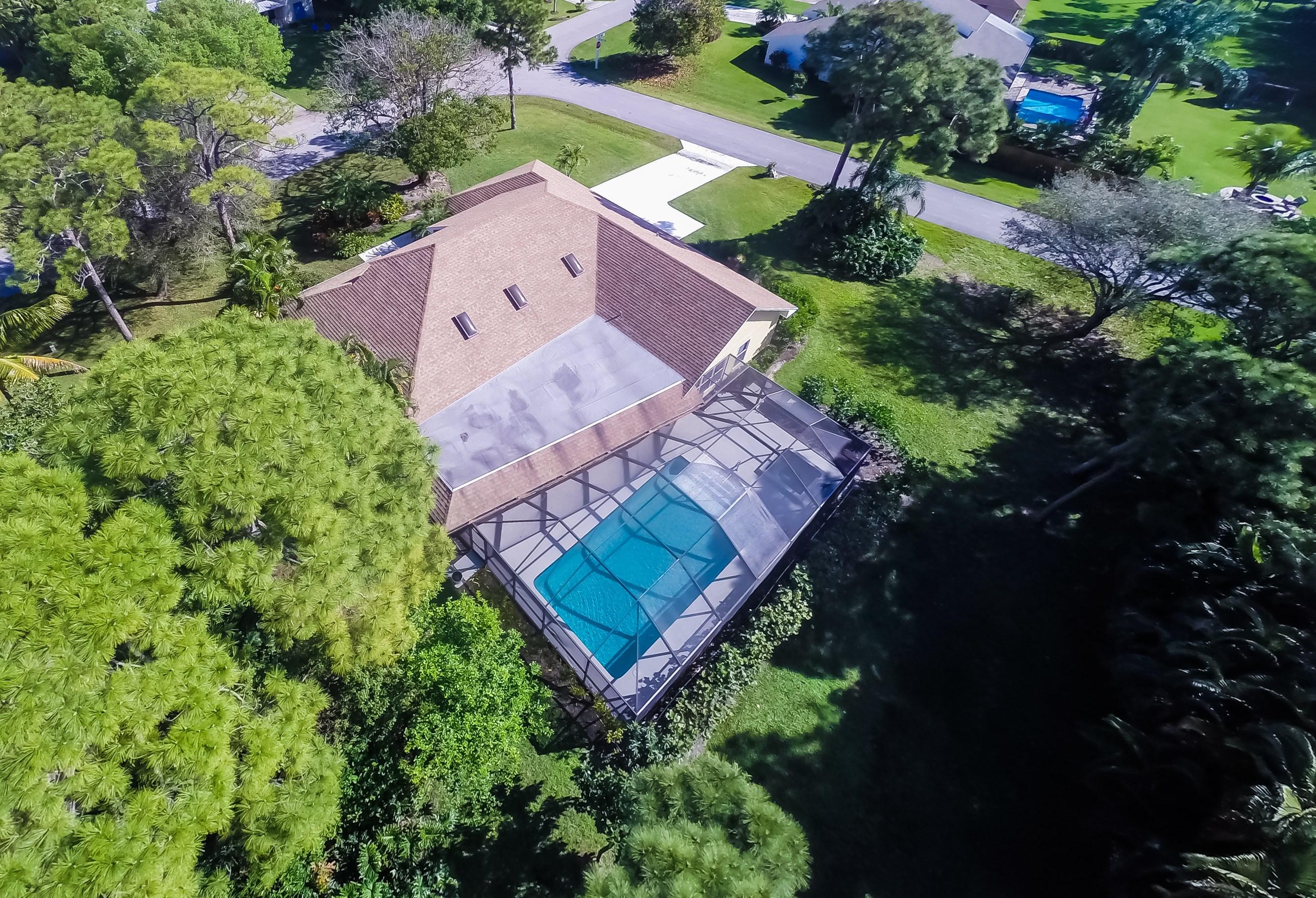 6230 Wood Lake Road Jupiter, FL 33458 - Photo 3 of 44 Oversized half acre lot with private, lu