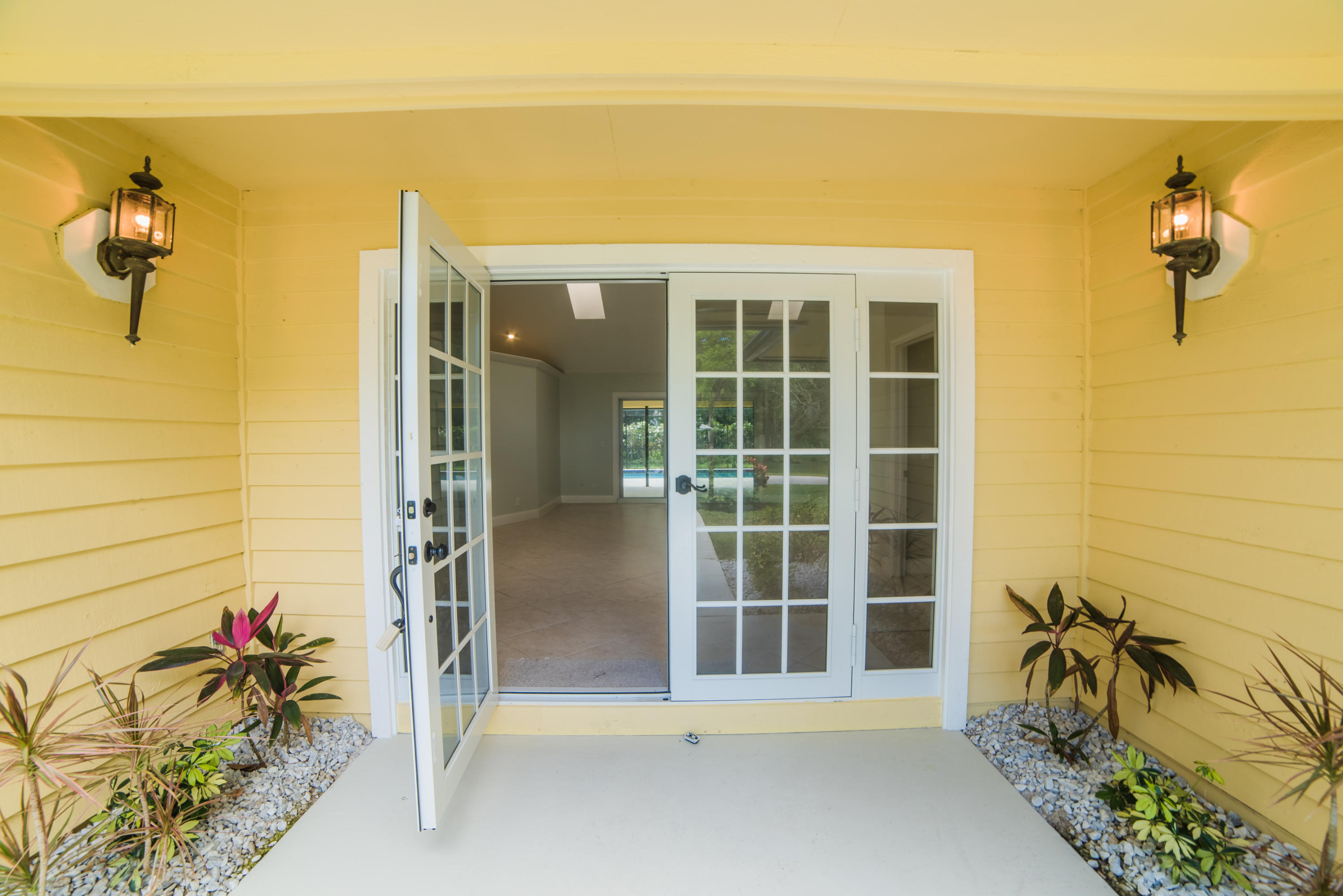 6230 Wood Lake Road Jupiter, FL 33458 - Photo 31 of 44 Front Door.jpg
