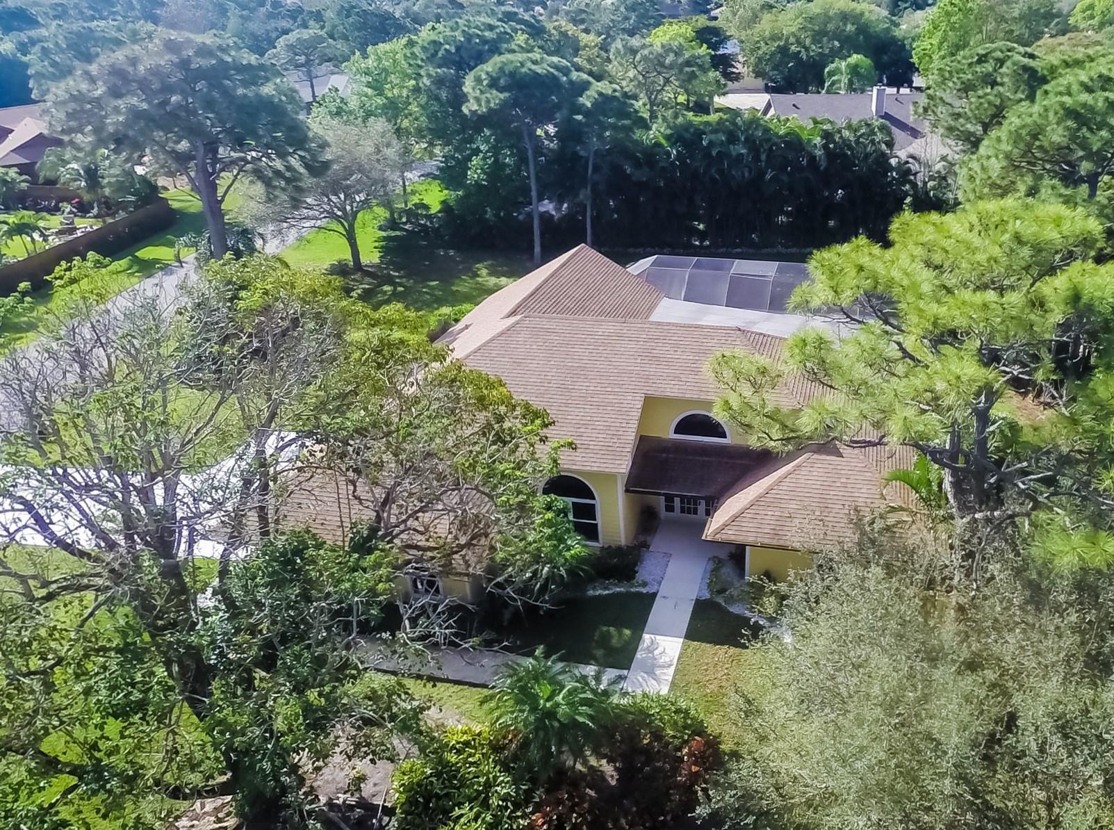 6230 Wood Lake Road Jupiter, FL 33458 - Photo 4 of 44 Aerial of Front of the House