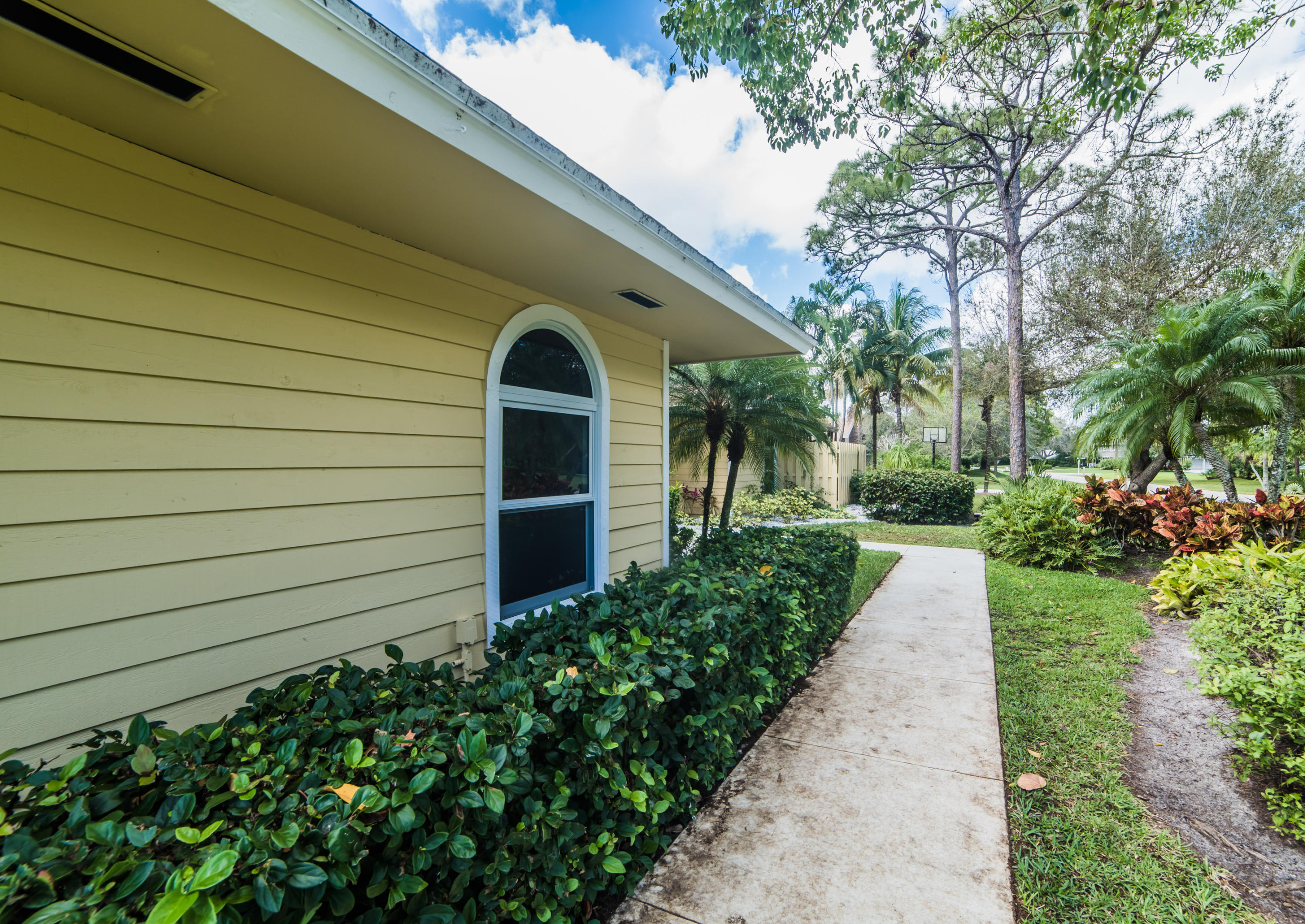 6230 Wood Lake Road Jupiter, FL 33458 - Photo 42 of 44 Side of House.jpg