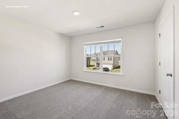 an empty room with window