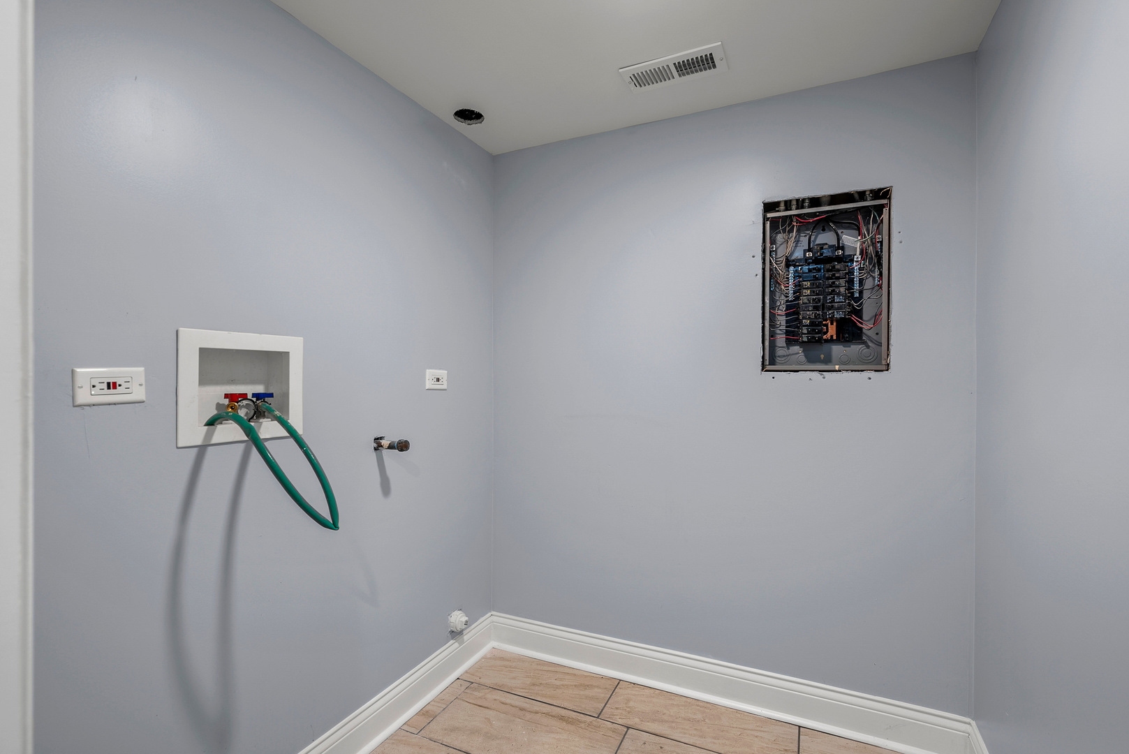 5418 West Flournoy Street Chicago, IL 60644 - Photo 15 of 16 a view of hallway with stairs