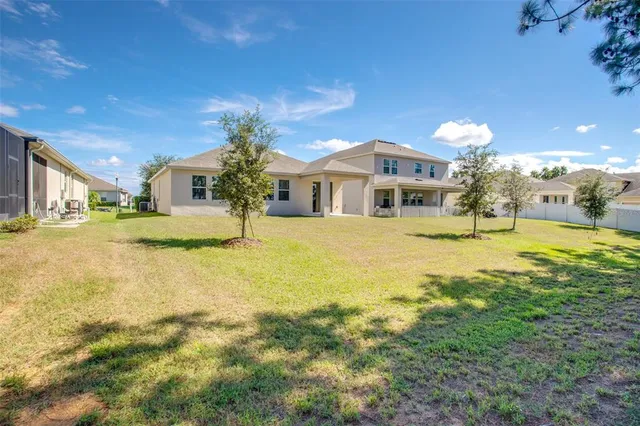 a view of a house with a swimming pool