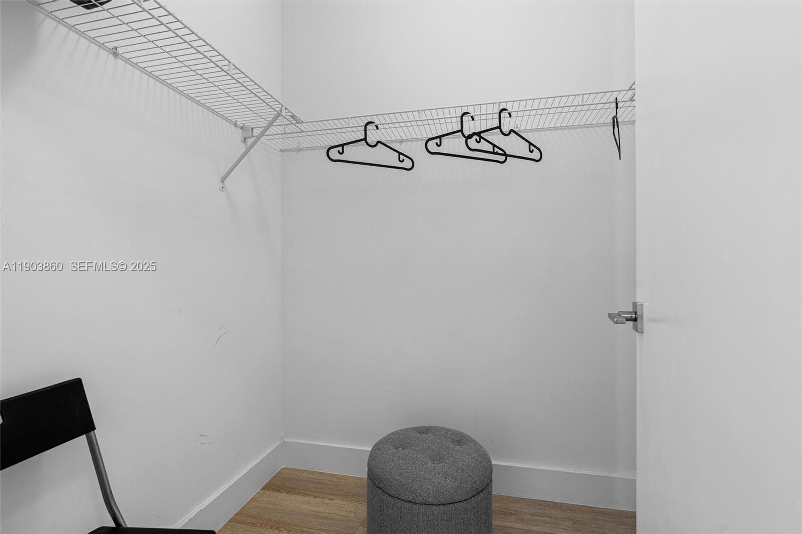 10330 Northwest 68th Street Doral, FL 33178 - Photo 32 of 60 a view of a room with rack on the wall