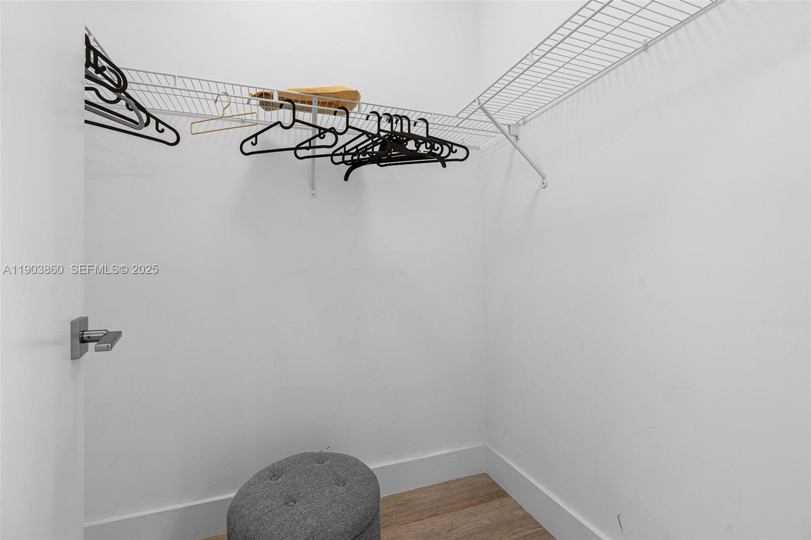 10330 Northwest 68th Street Doral, FL 33178 - Photo 33 of 60 a view of a room with rack on the wall