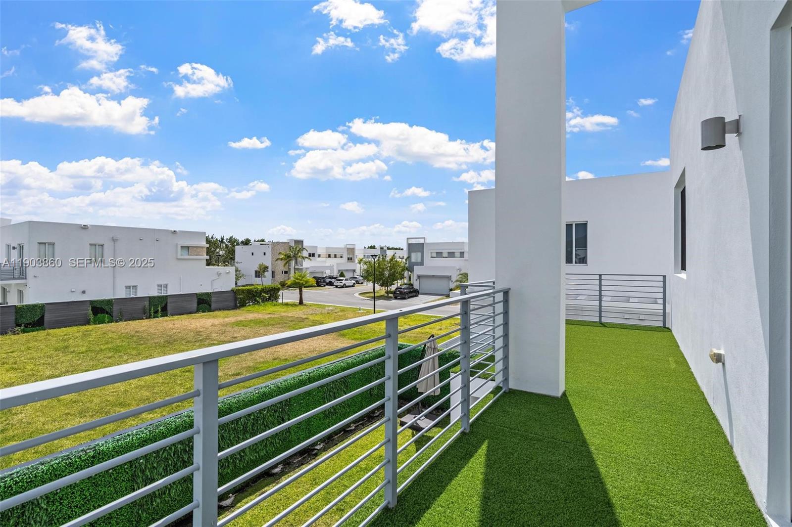 10330 Northwest 68th Street Doral, FL 33178 - Photo 39 of 60 a view of an chairs and table in the balcony