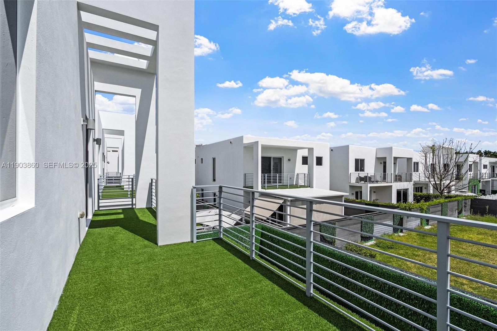 10330 Northwest 68th Street Doral, FL 33178 - Photo 40 of 60 a view of a house with backyard and porch