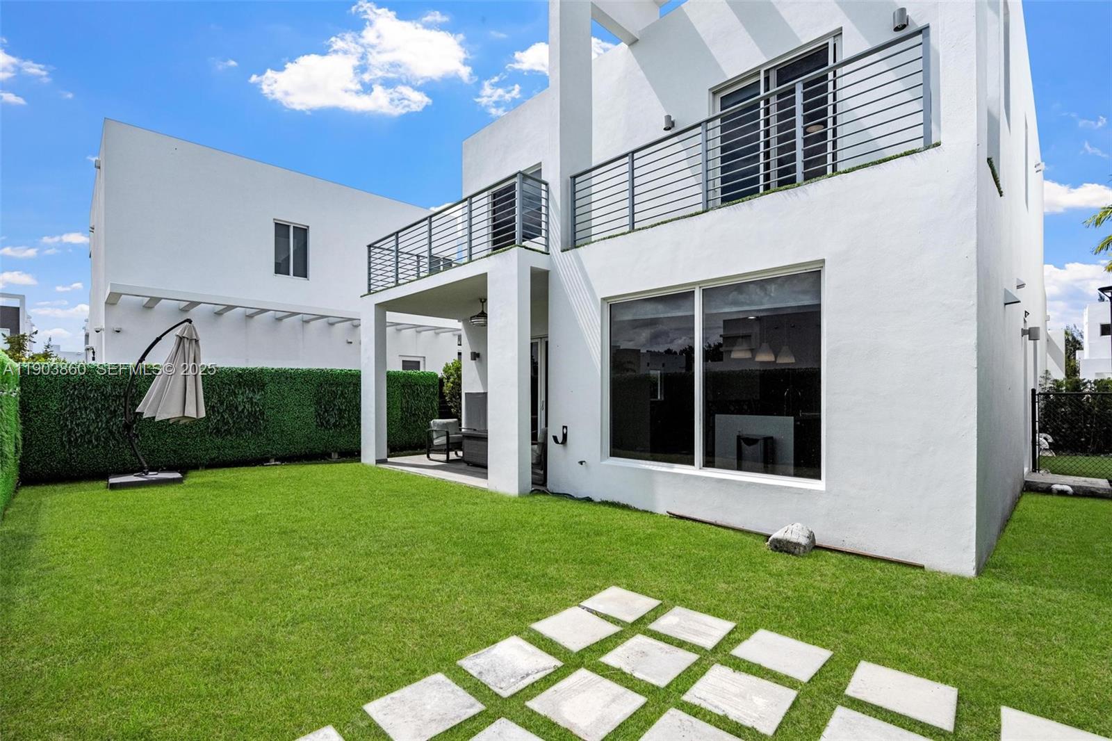10330 Northwest 68th Street Doral, FL 33178 - Photo 47 of 60 a view of a house with garden