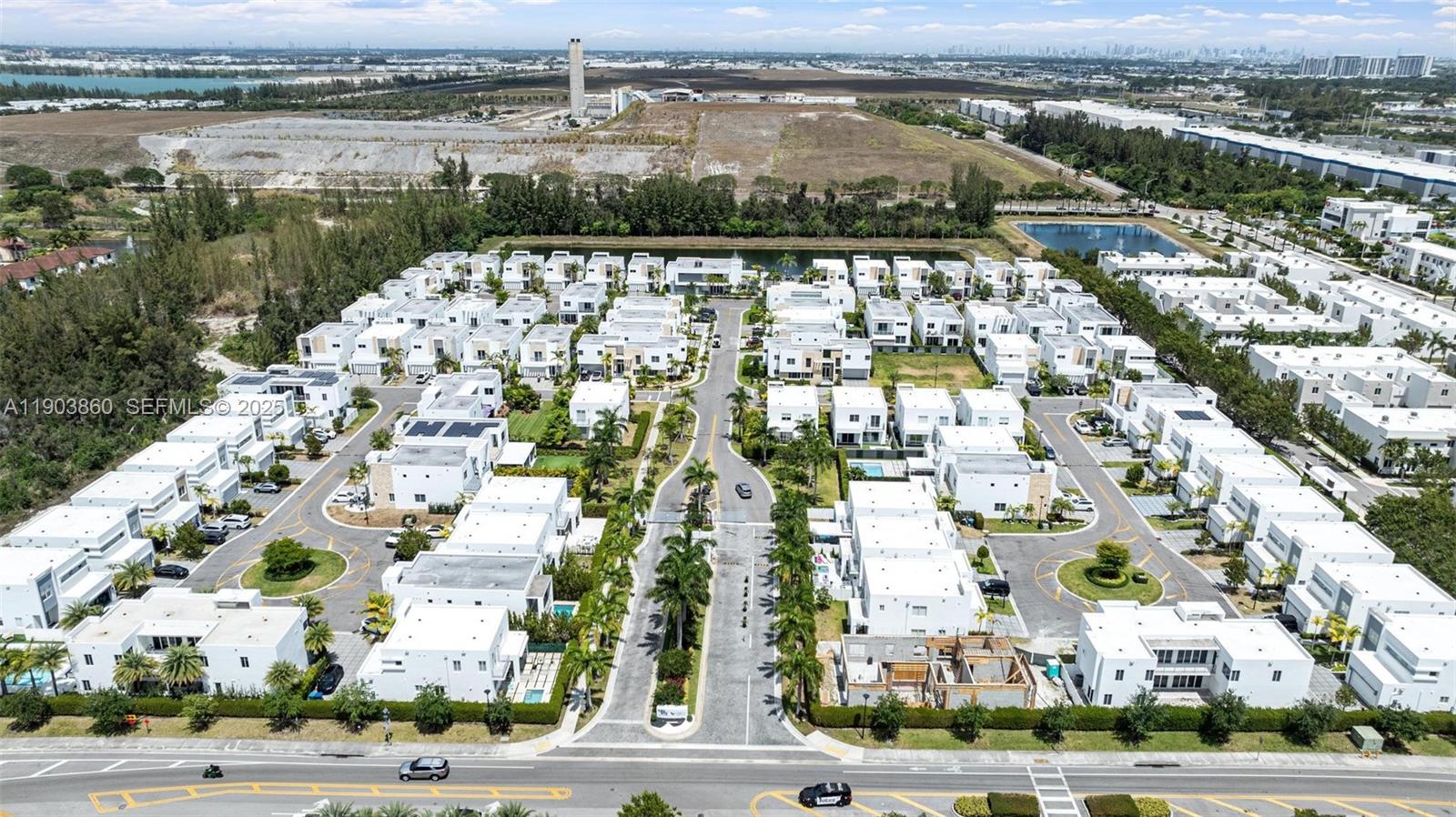 10330 Northwest 68th Street Doral, FL 33178 - Photo 56 of 60 an aerial view of residential houses with outdoor space and lake view