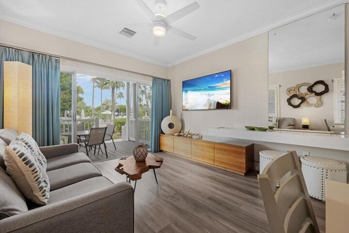 5092 Sunset Village Drive Duck Key, FL 33050 - Photo 13 of 48 a living room with furniture and a large window