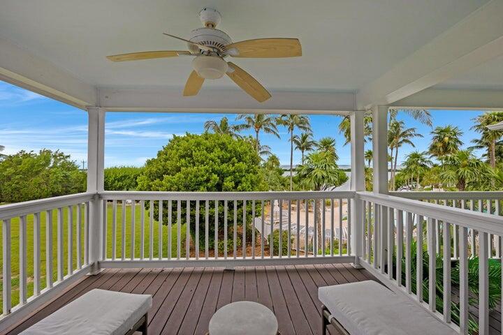 5092 Sunset Village Drive Duck Key, FL 33050 - Photo 32 of 48 a view of a chairs in a balcony
