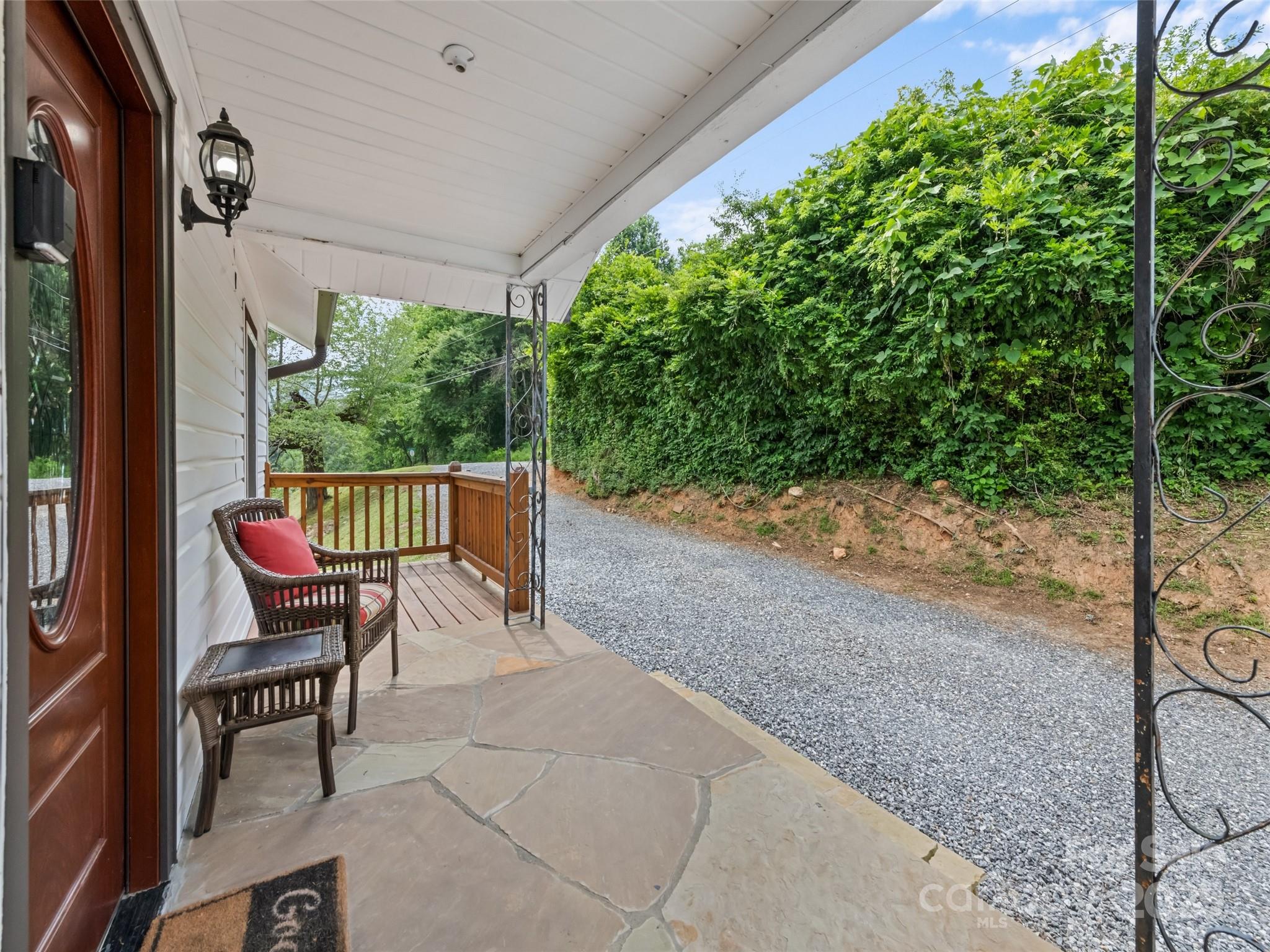 229 Yellow Bird Br Road Sylva, NC 28779 - Photo 11 of 34 a view of a chairs in a patio