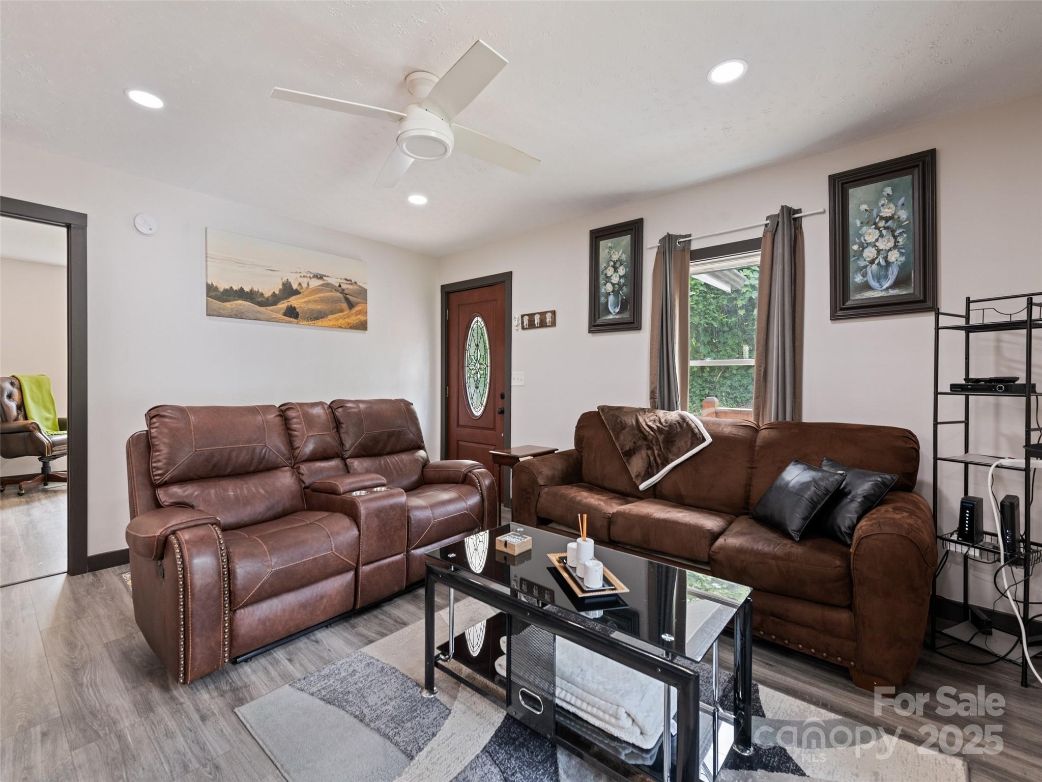 229 Yellow Bird Br Road Sylva, NC 28779 - Photo 14 of 34 a living room with furniture and a window