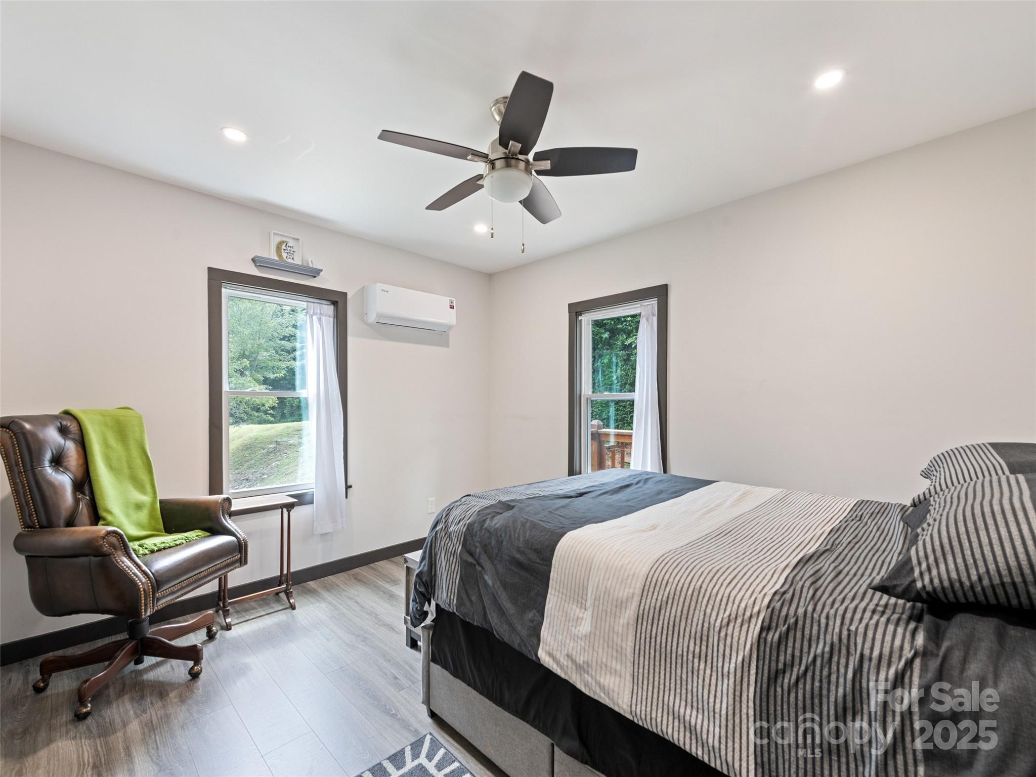 229 Yellow Bird Br Road Sylva, NC 28779 - Photo 23 of 34 a bedroom with a bed and a window
