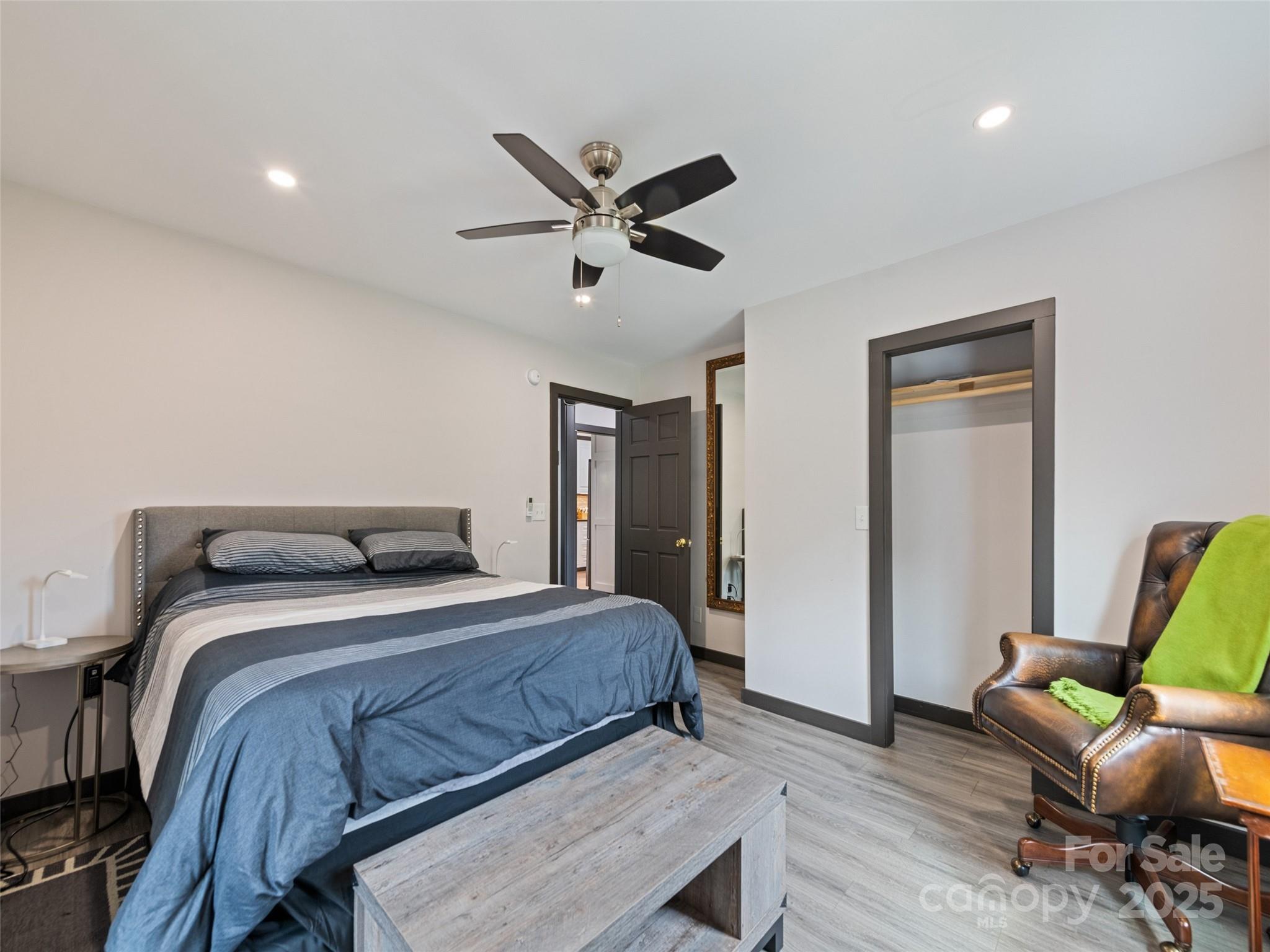 229 Yellow Bird Br Road Sylva, NC 28779 - Photo 24 of 34 a bedroom with a bed and furniture