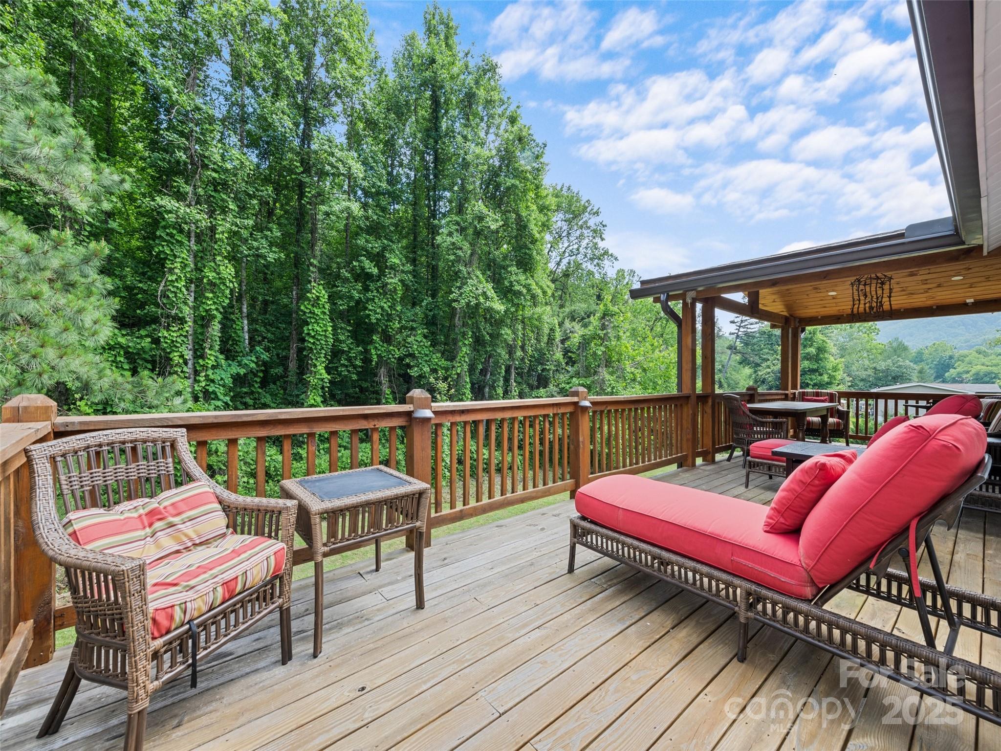 229 Yellow Bird Br Road Sylva, NC 28779 - Photo 26 of 34 a view of sitting area with furniture on wooden deck