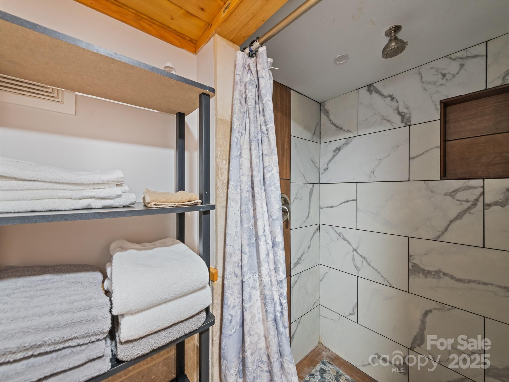 229 Yellow Bird Br Road Sylva, NC 28779 - Photo 34 of 34 a bathroom with a shower