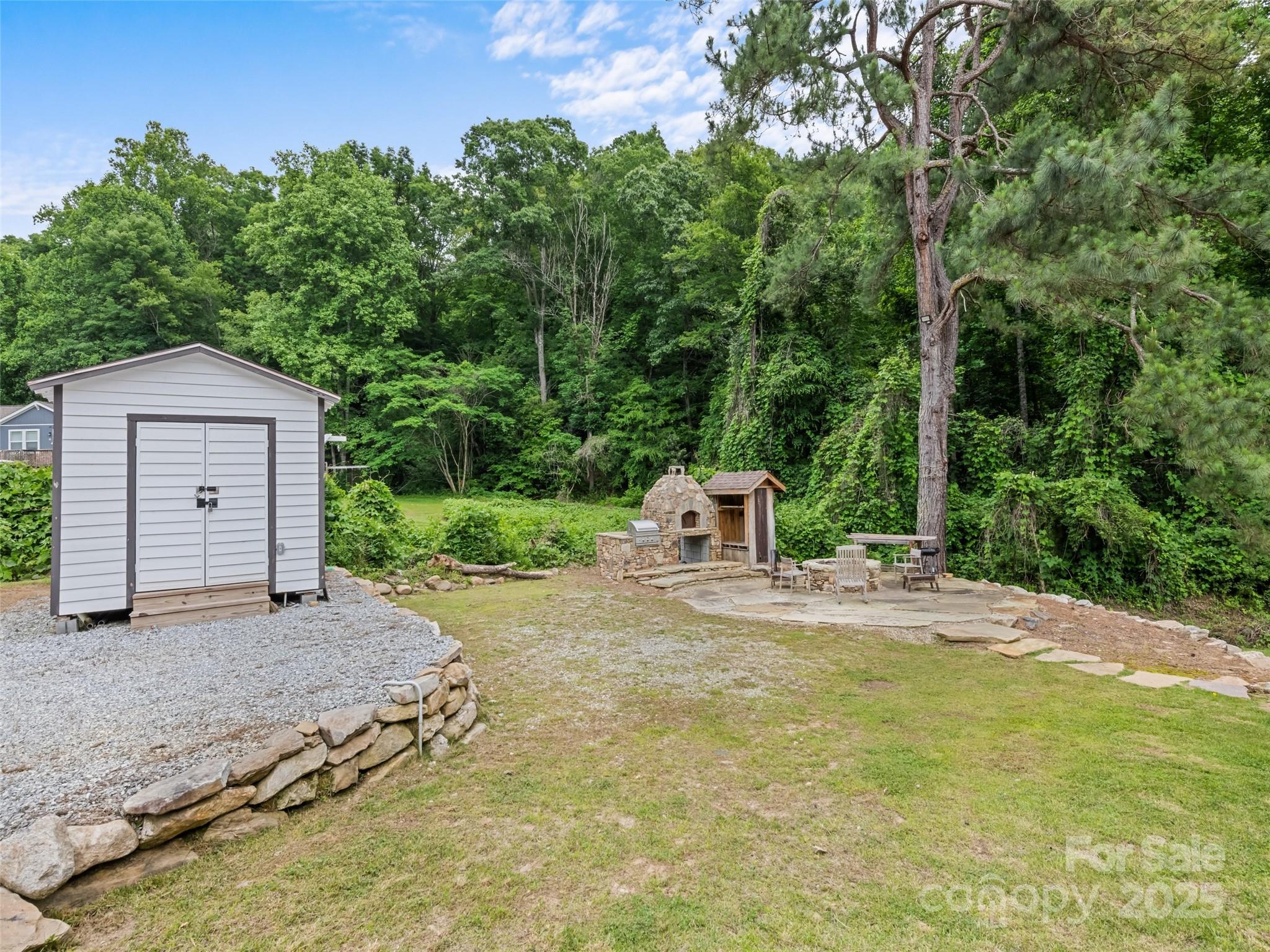 229 Yellow Bird Br Road Sylva, NC 28779 - Photo 6 of 34 a house with trees in the background