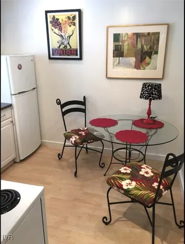 a bedroom with double bed and a large mirror