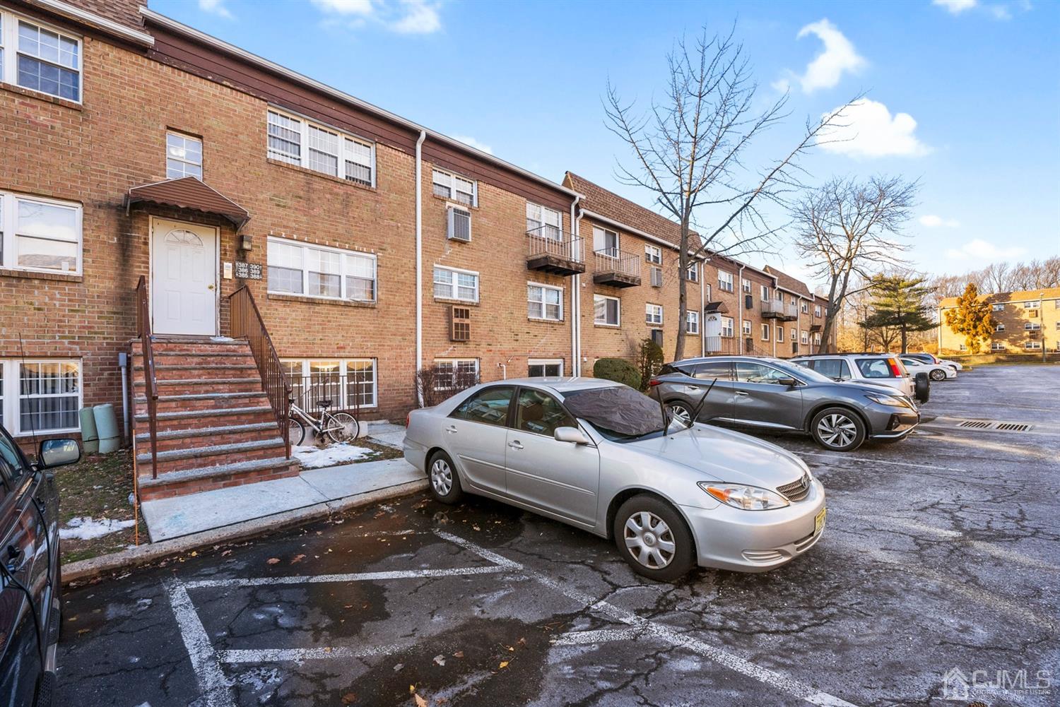 390 College Drive Edison, NJ 08817 - Photo 17 of 17 a car parked in front of a house