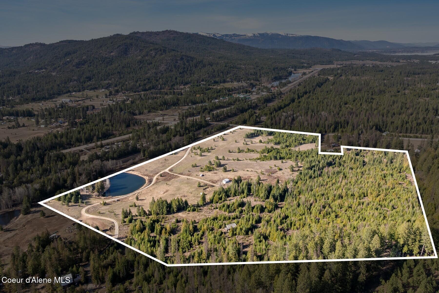 233 James Road Sagle, ID 83860 - Photo 7 of 17 Parcel Boundary with Pond