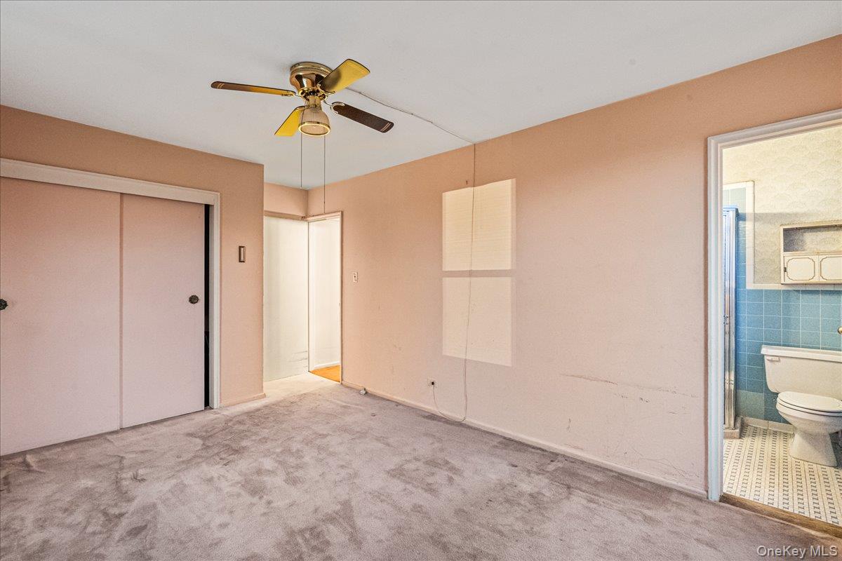 209-25 18th Avenue, Unit 6D Queens, NY 11360 - Photo 16 of 26 a view of empty room with wooden floor