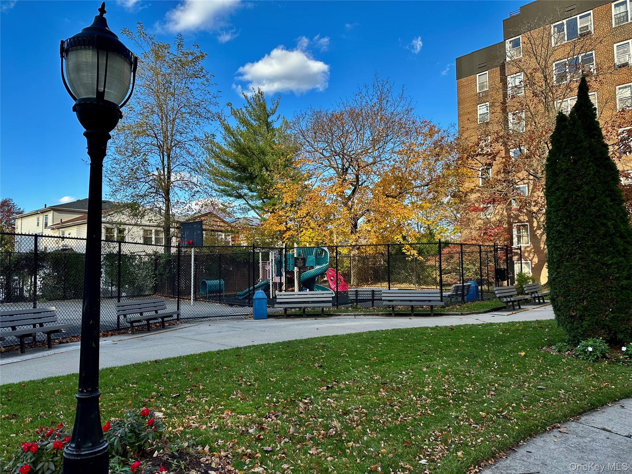 209-25 18th Avenue, Unit 6D Queens, NY 11360 - Photo 25 of 26 a view of a yard with a fountain
