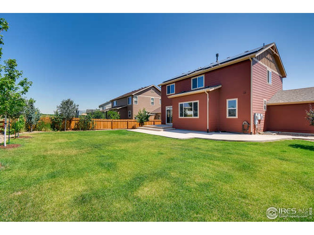 8597 Raspberry Drive Frederick, CO 80504 - Photo 3 of 21 a view of a yard in front of house