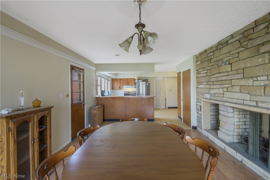 6059 North Oval Road Clinton, OH 44216 - Photo 6 of 28 Share meals with family while enjoying a fire.