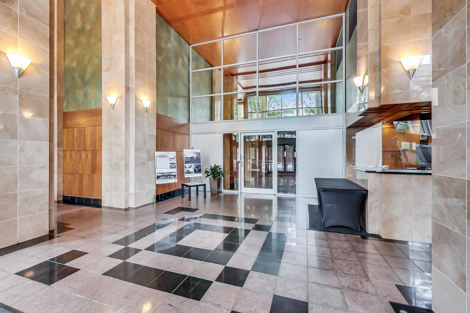 1122 North Clark Street, Unit 3304 Chicago, IL 60610 - Photo 15 of 32 a view of a building with sitting area