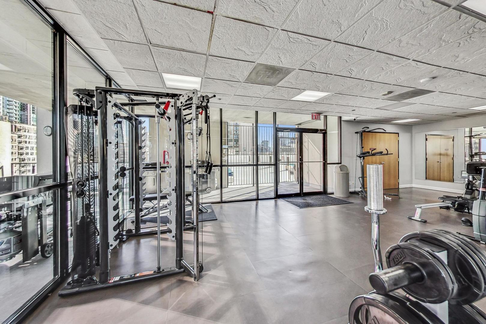1122 North Clark Street, Unit 3304 Chicago, IL 60610 - Photo 21 of 32 a view of a room with gym equipment