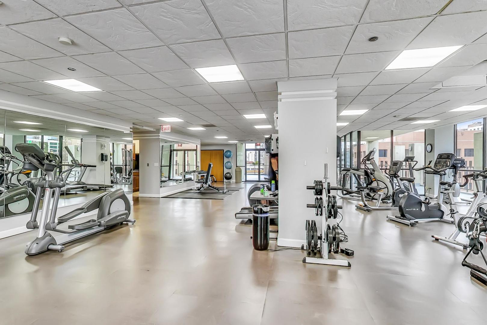 1122 North Clark Street, Unit 3304 Chicago, IL 60610 - Photo 22 of 32 a view of a room with gym equipment