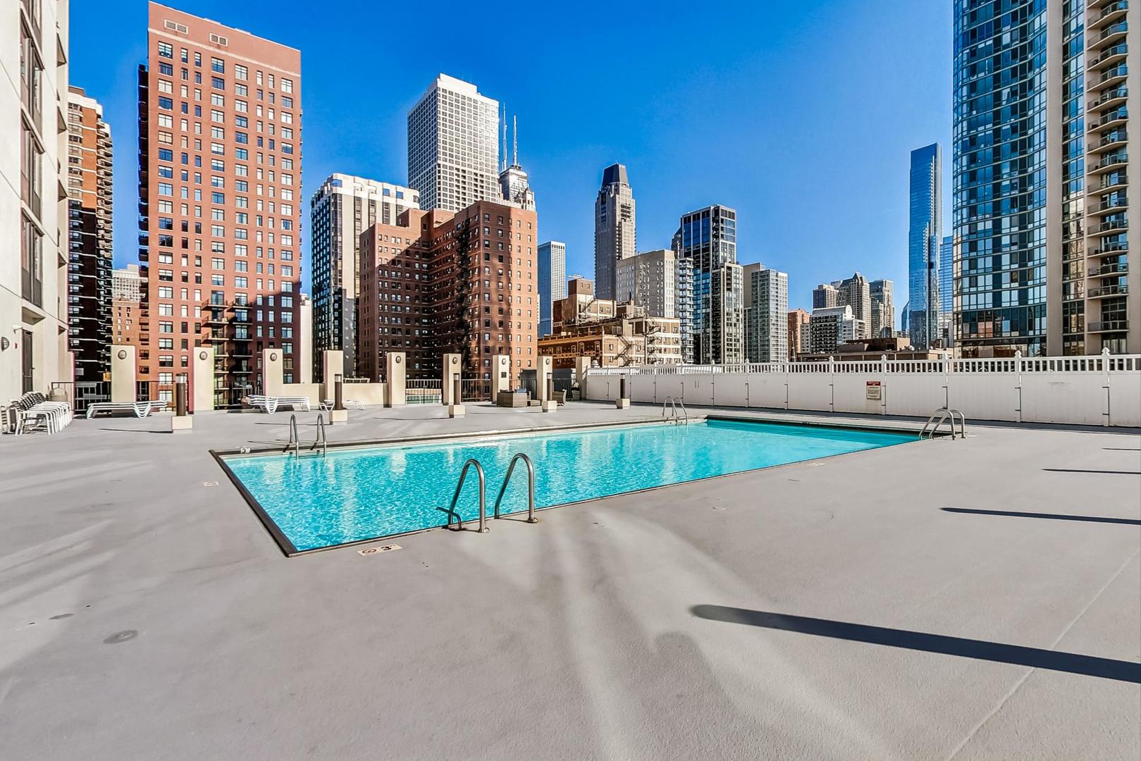 1122 North Clark Street, Unit 3304 Chicago, IL 60610 - Photo 26 of 32 a view of a city with tall buildings
