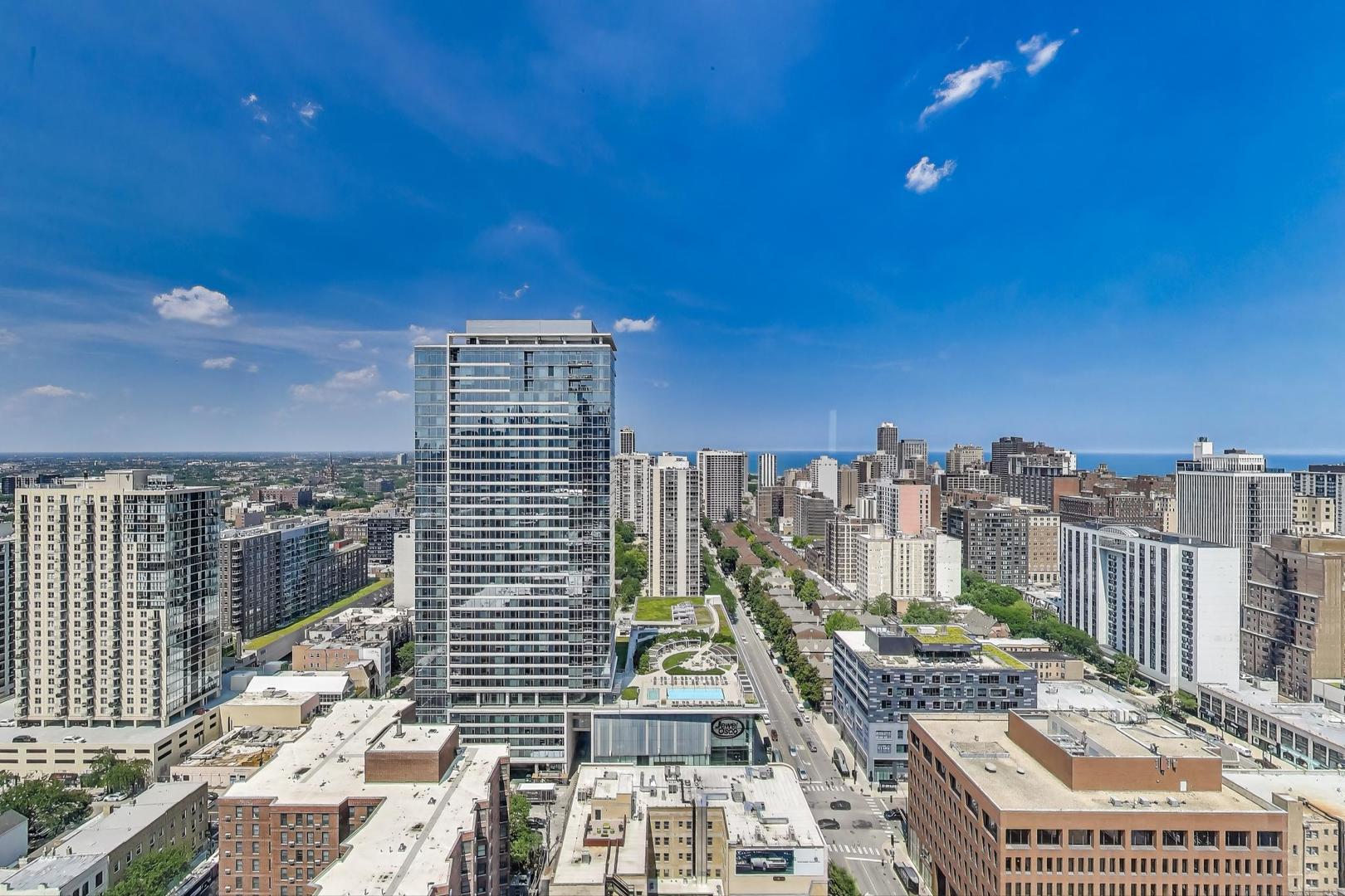 1122 North Clark Street, Unit 3304 Chicago, IL 60610 - Photo 5 of 32 a view of a balcony with city view