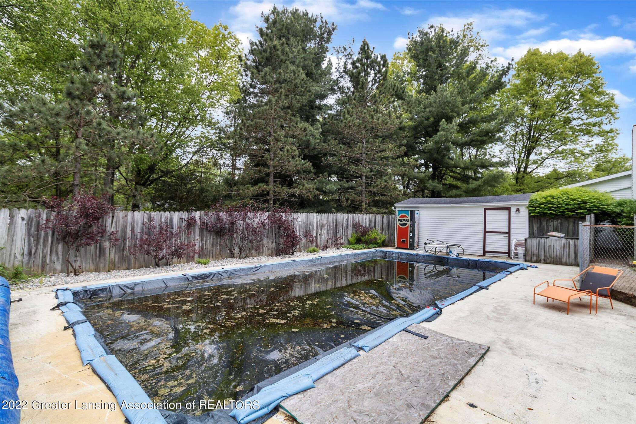 9810 Coleman Road Haslett, MI 48840 - Photo 57 of 82 58-9810-Coleman-Rd-WindowStill-Real-Esta