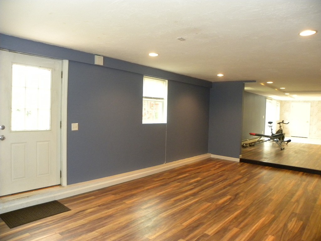 82 Sandersdale Road Charlton, MA 01507 - Photo 26 of 30 a view of kitchen and empty room with wooden floor