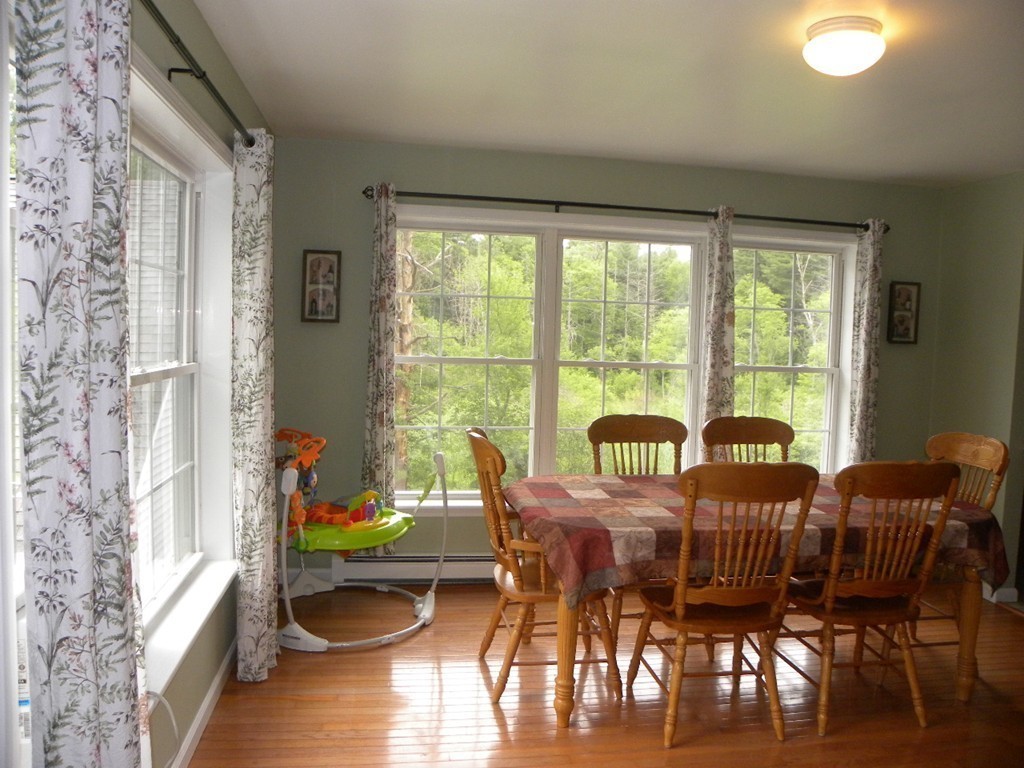 82 Sandersdale Road Charlton, MA 01507 - Photo 8 of 30 a view of a dining room with furniture window and wooden floor