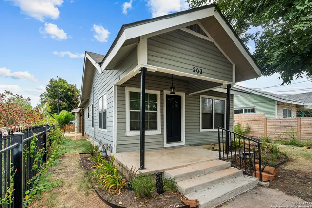 a front view of a house with a porch