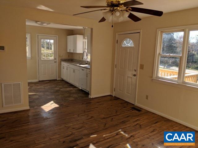 982 Dunnes Shop Road Ruckersville, VA 22968 - Photo 11 of 19 a view of an empty room with window and wooden floor