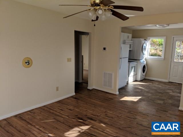 982 Dunnes Shop Road Ruckersville, VA 22968 - Photo 12 of 19 a view of a room with a flat screen tv and wooden floor