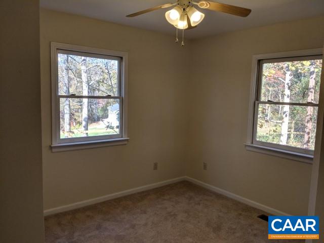 982 Dunnes Shop Road Ruckersville, VA 22968 - Photo 13 of 19 an empty room with a window