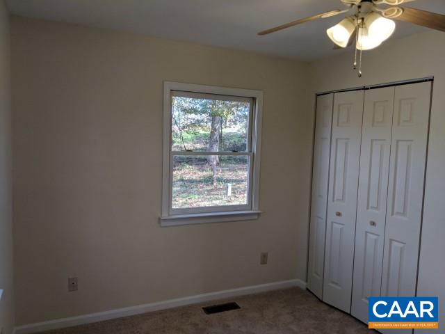 982 Dunnes Shop Road Ruckersville, VA 22968 - Photo 14 of 19 a view of an empty room with a window