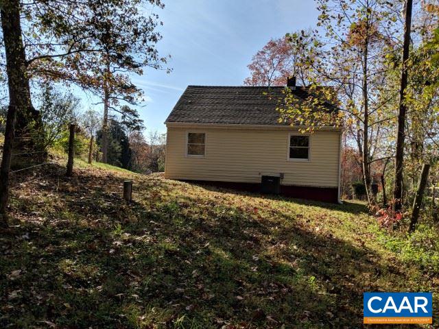 982 Dunnes Shop Road Ruckersville, VA 22968 - Photo 17 of 19 a house with a tree in front of it
