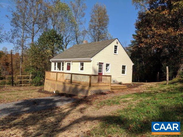982 Dunnes Shop Road Ruckersville, VA 22968 - Photo 3 of 19 a view of a white house with a yard