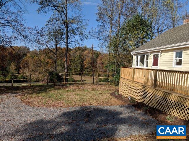 982 Dunnes Shop Road Ruckersville, VA 22968 - Photo 6 of 19 a view of a house with a yard