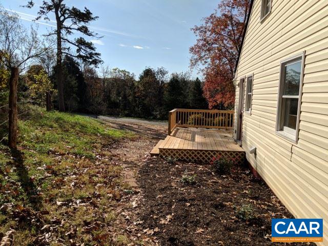 982 Dunnes Shop Road Ruckersville, VA 22968 - Photo 7 of 19 a view of a yard with plants and trees