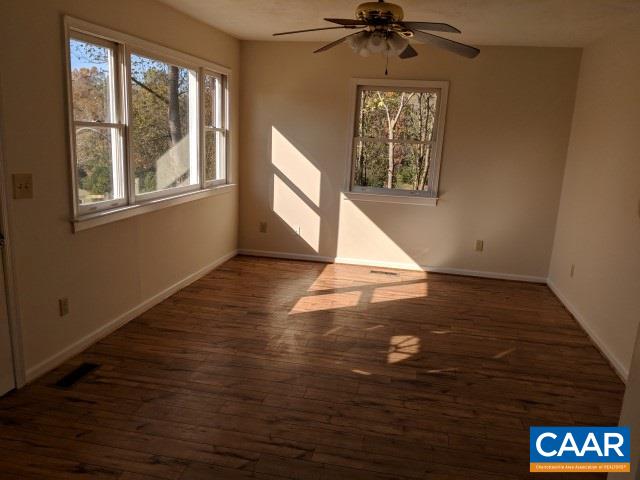 982 Dunnes Shop Road Ruckersville, VA 22968 - Photo 8 of 19 a view of an empty room with a window