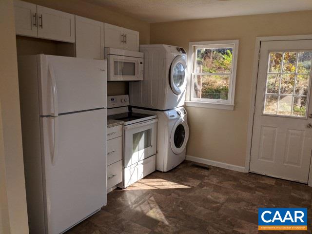 982 Dunnes Shop Road Ruckersville, VA 22968 - Photo 9 of 19 a utility room with refrigerator a washer and dryer