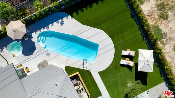 an aerial view of a swimming pool