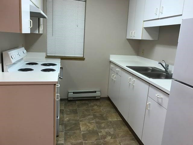 221 Peach Street Luling, TX 78648 - Photo 6 of 6 a utility room with dryer and washer
